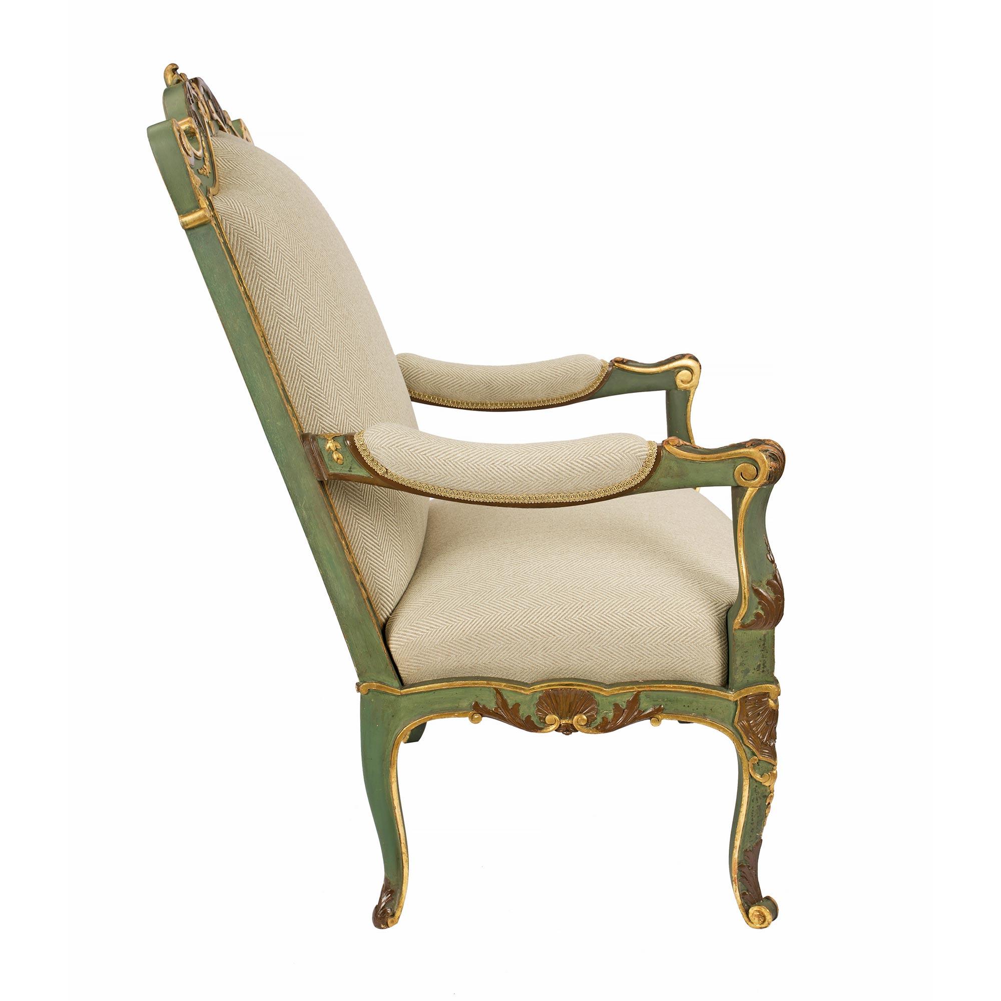 pair of French 19th century Louis XV st. patinated and Giltwood armchairs In Good Condition For Sale In West Palm Beach, FL