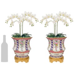 Pair of French 19th century Louis XV st. Sévres Porcelain and Ormolu vases