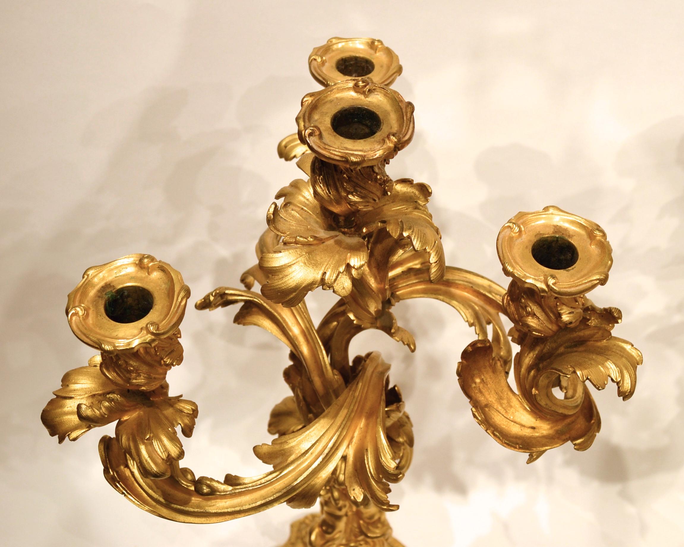 Pair of finest quality French 19th Century Louis XV style  Gilt Bronze four arm Candelabras with Royal code of arms.