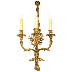 Pair of French 19th Century Louis XV Style Three-Light Gilt-Bronze Wall Sconces