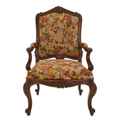 Pair of French 19th Century Louis XV Walnut and Tapestry À Chasis Armchairs