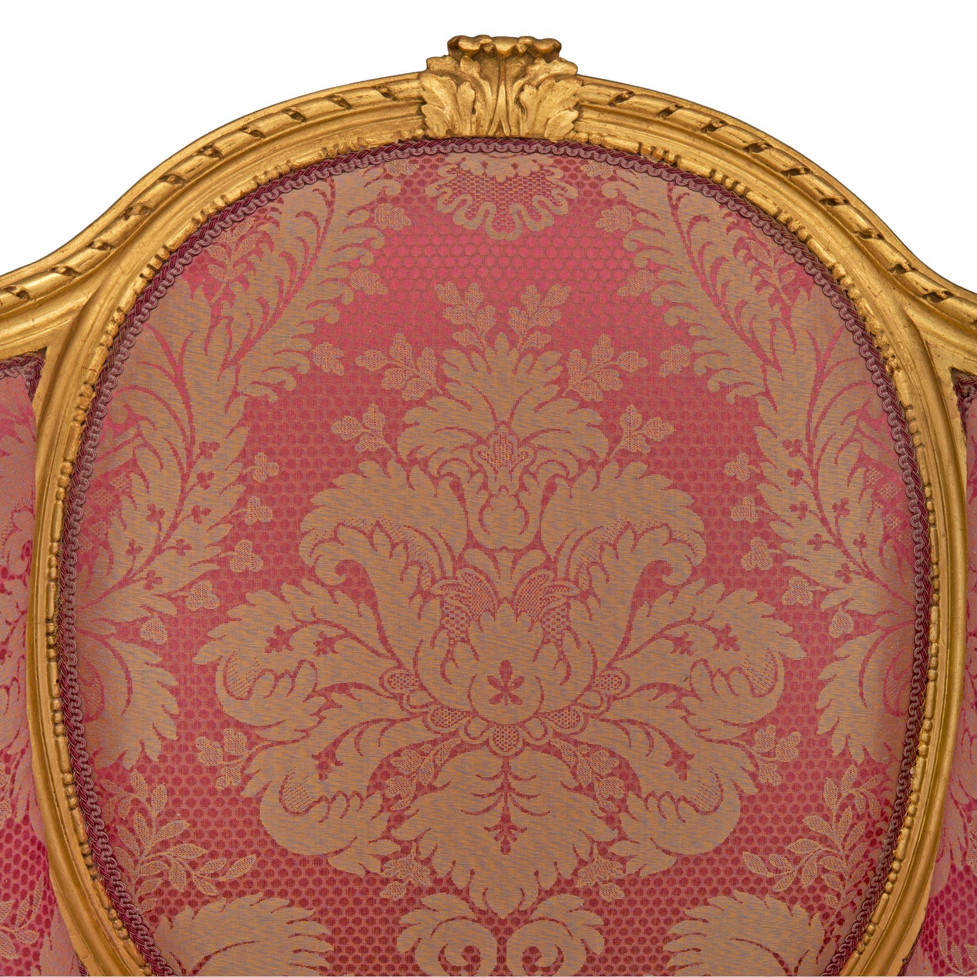 Legno dorato Coppia di poltrone Luigi XVI St. francesi del XIX secolo in vendita