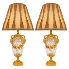pair of French 19th century Louis XVI st. Baccarat Crystal and Ormolu lamps