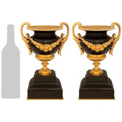 Pair of French 19th century Louis XVI st. Black Belgian marble and Ormolu Urns