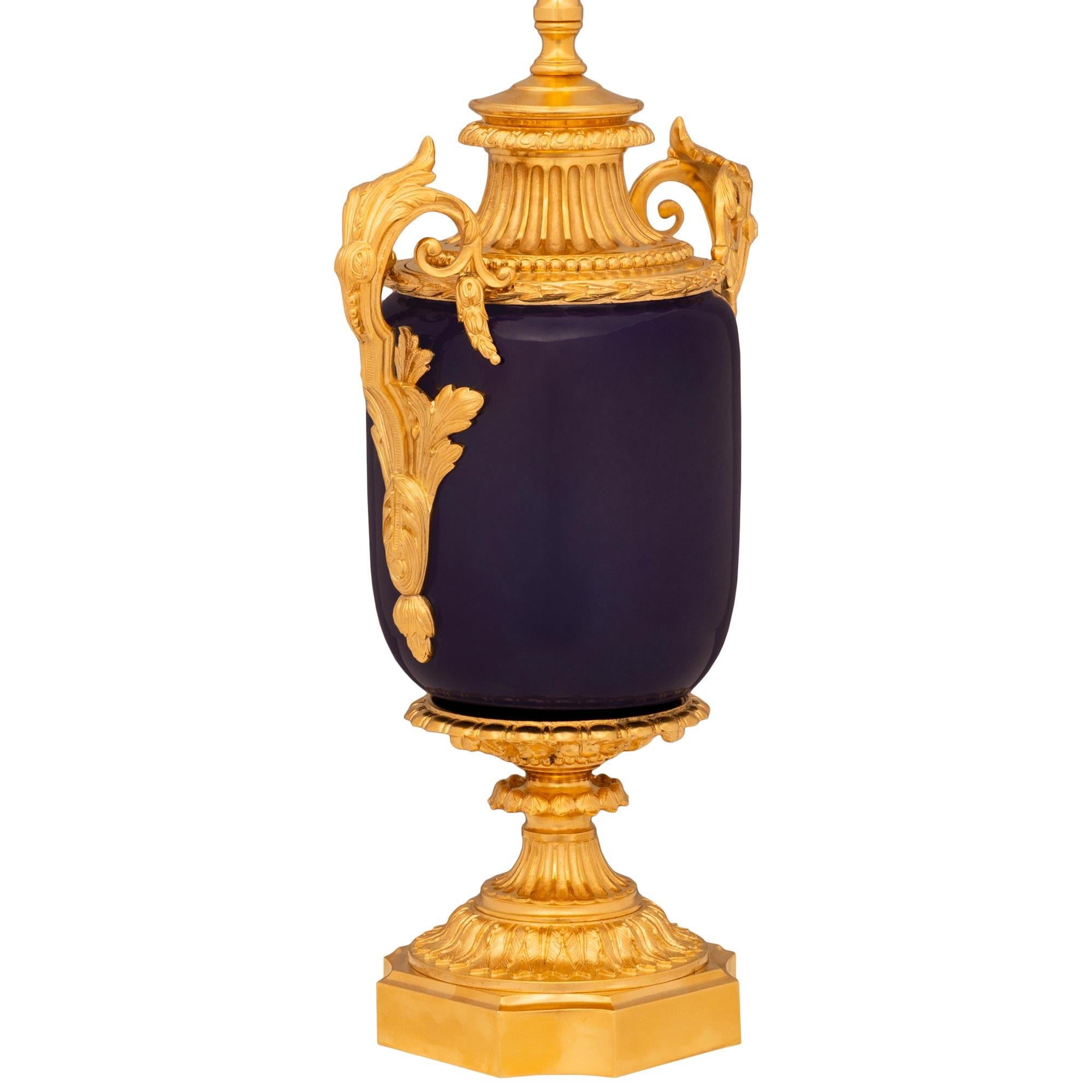 Pair of French 19th century Louis XVI st. blue Sévres Porcelain, Ormolu lamps In Good Condition For Sale In West Palm Beach, FL