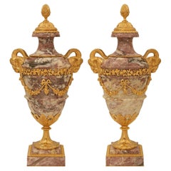 pair of French 19th century Louis XVI st. Breche Violette marble and Ormolu urns