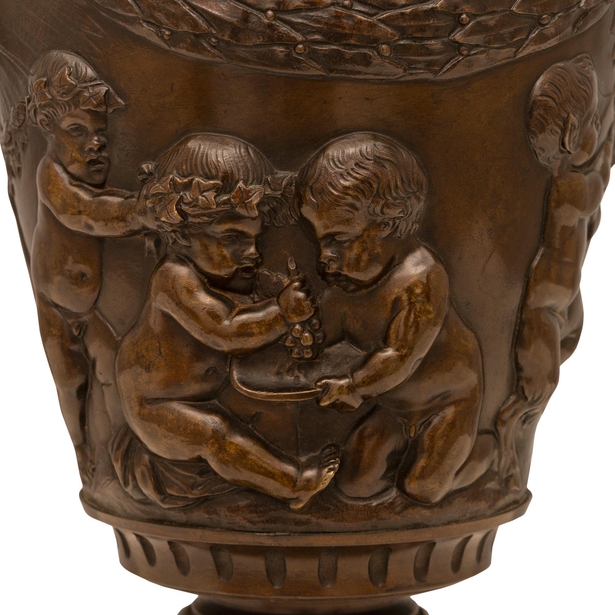 Pair of French 19th Century Louis XVI St. Bronze and Marble Urns Signed Clodion For Sale 4