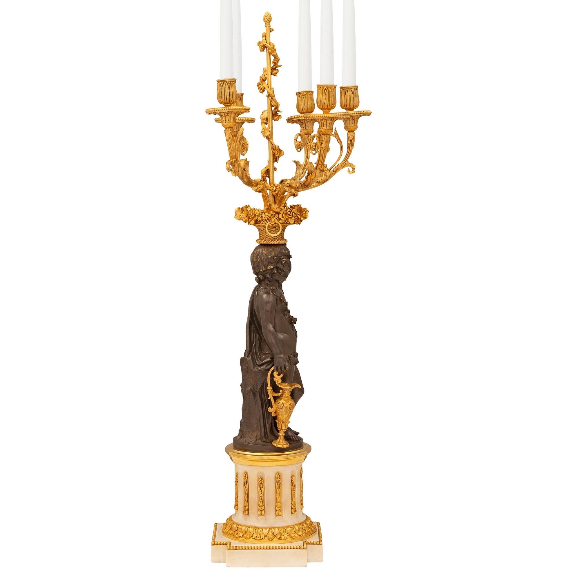 Pair of French 19th Century Louis XVI St. Bronze and Ormolu Candelabras In Good Condition For Sale In West Palm Beach, FL