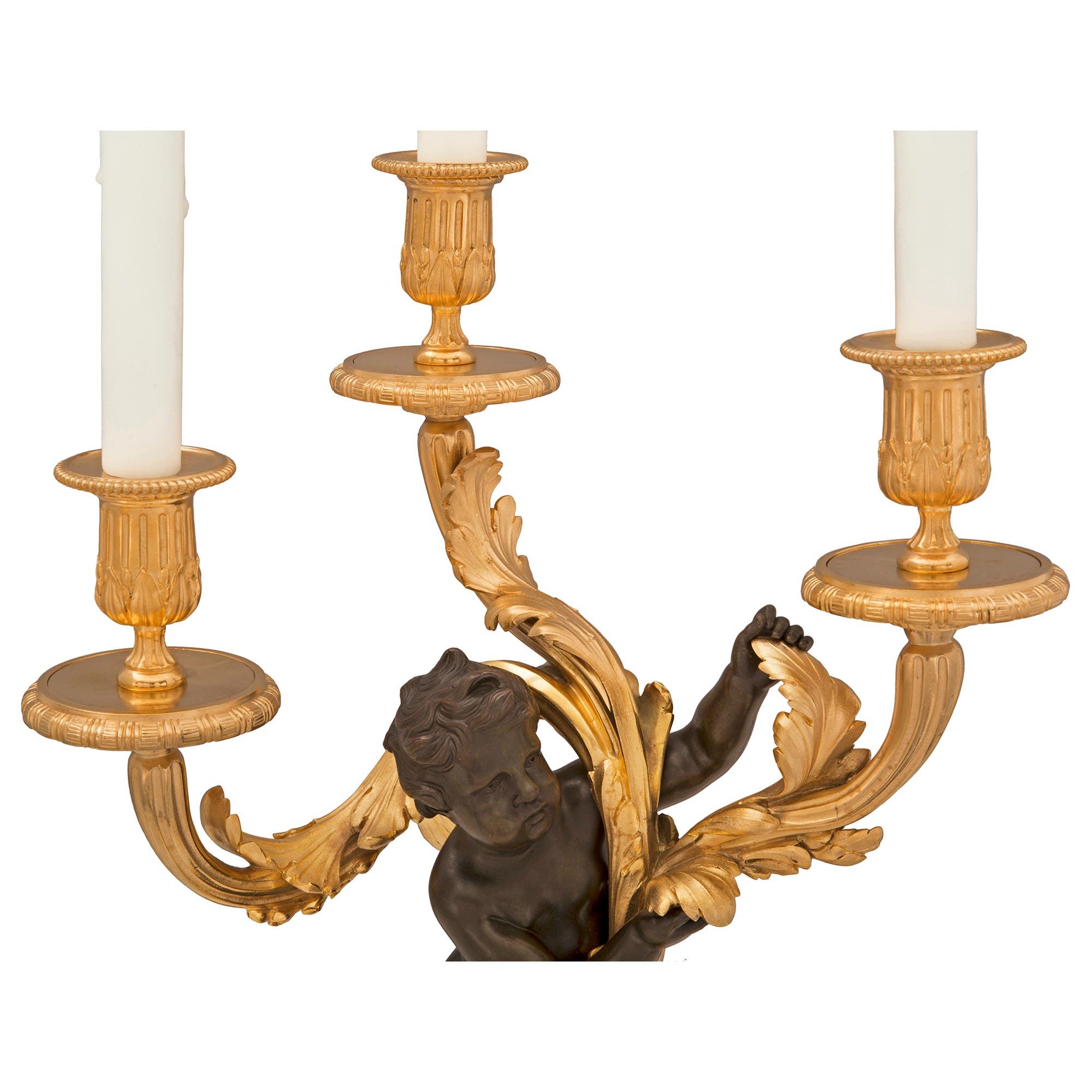 Patinated Pair of French 19th Century Louis XVI St. Bronze, Ormolu and Marble Lamps For Sale