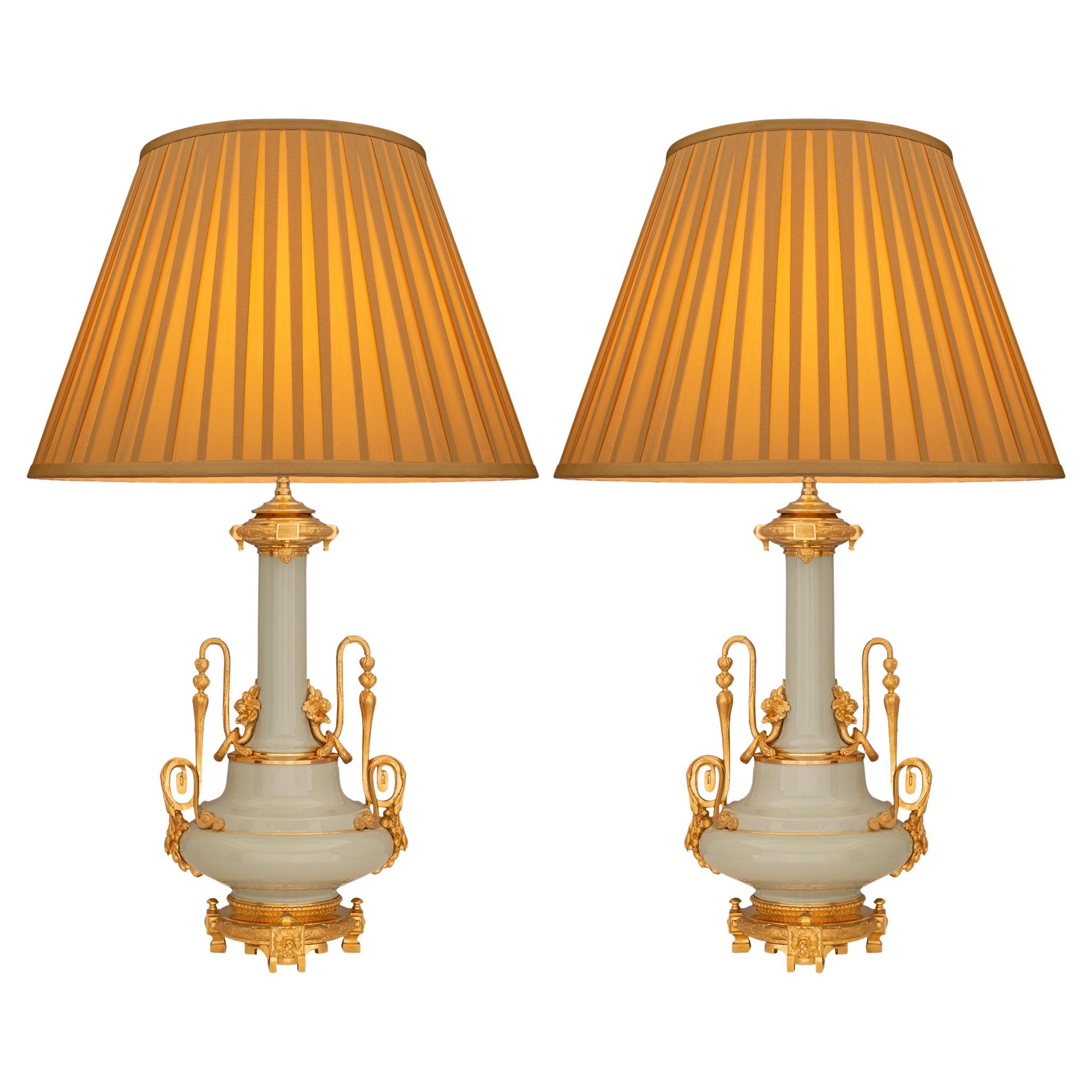 Pair of French 19th Century Louis XVI St. Celadon Porcelain and Ormolu Lamps For Sale