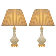 Antique pair of French 19th century Louis XVI st. Celadon porcelain and Ormolu lamps