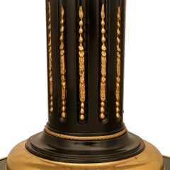 pair of French 19th century Louis XVI st. Ebony, Ormolu and Marble pedestals