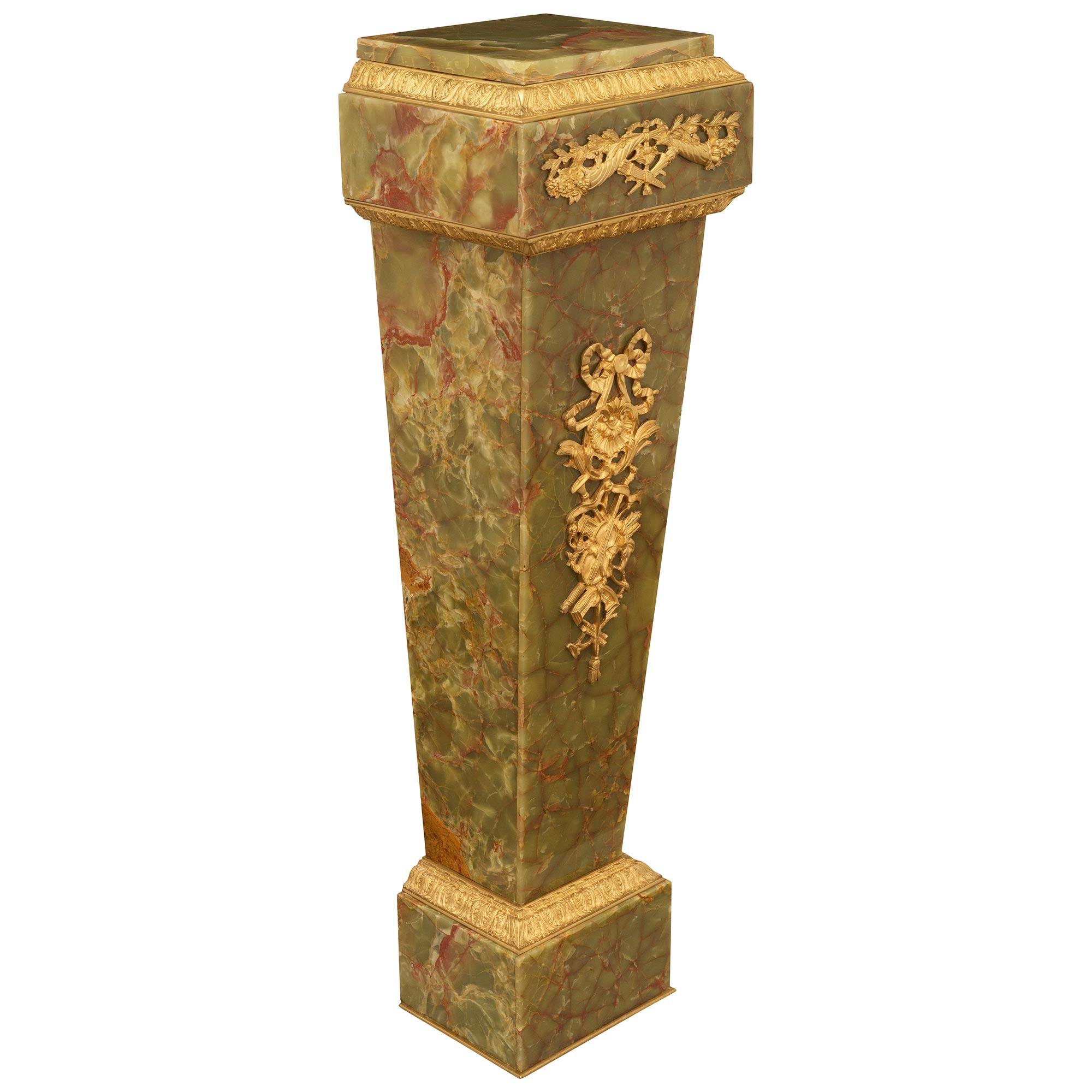 Bronze doré pair of French 19th century Louis XVI st. Ebony, Ormolu and Marble pedestals en vente