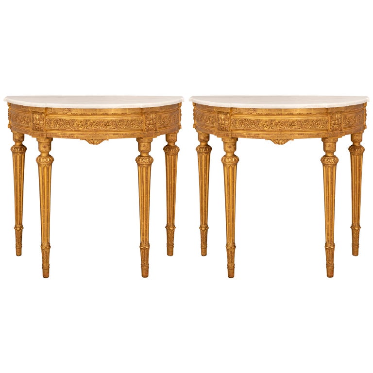Pair of French 19th Century Louis XVI St. Giltwood and Marble Consoles