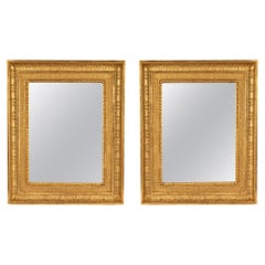 Coppia di specchi francesi del XIX secolo in legno di gilt Luigi XVI