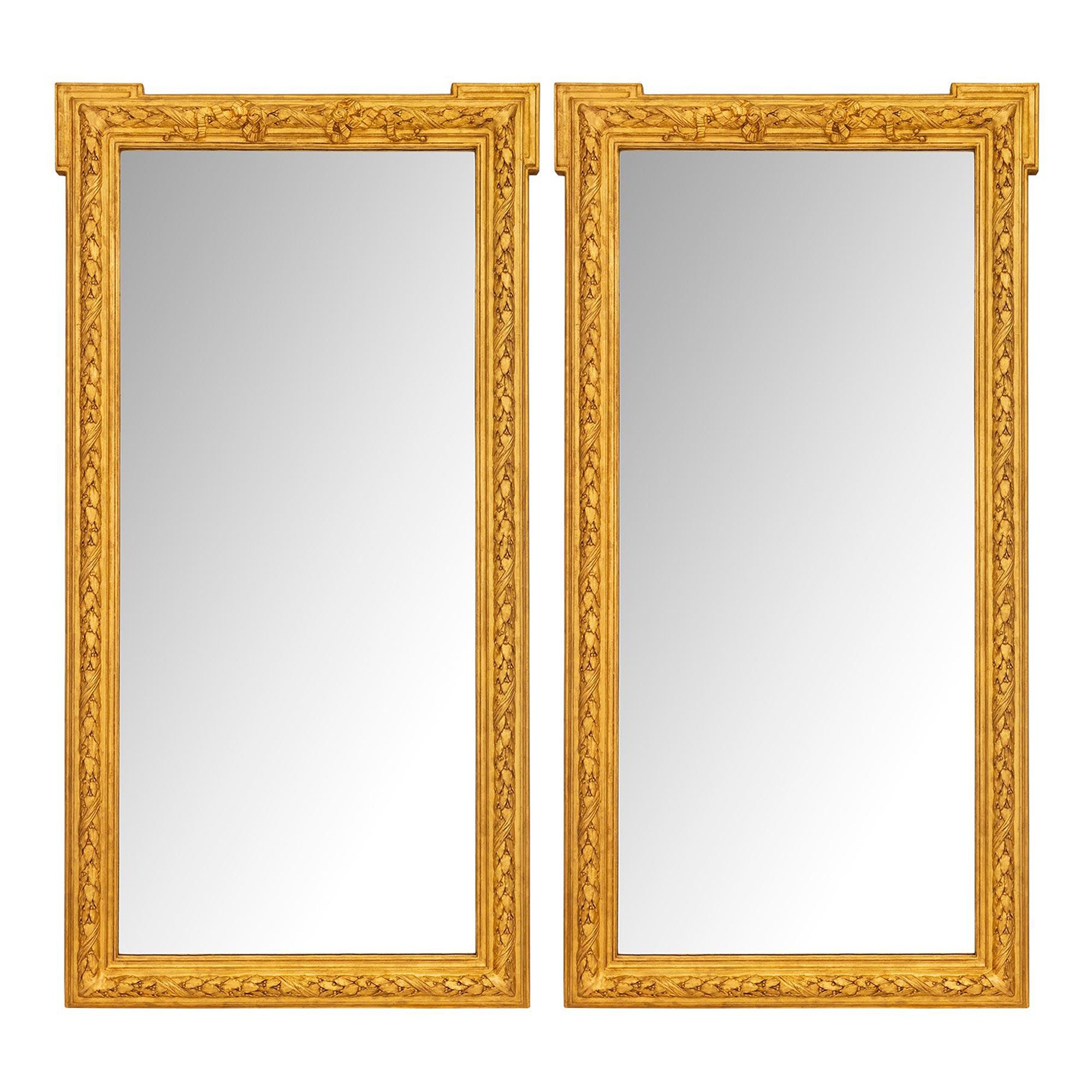 Paire de miroirs français Louis XVI du 19ème siècle en bois doré