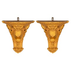 pair of French 19th century Louis XVI st. Giltwood wall brackets