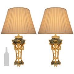pair of French 19th century Louis XVI st. Marble and Ormolu lamps