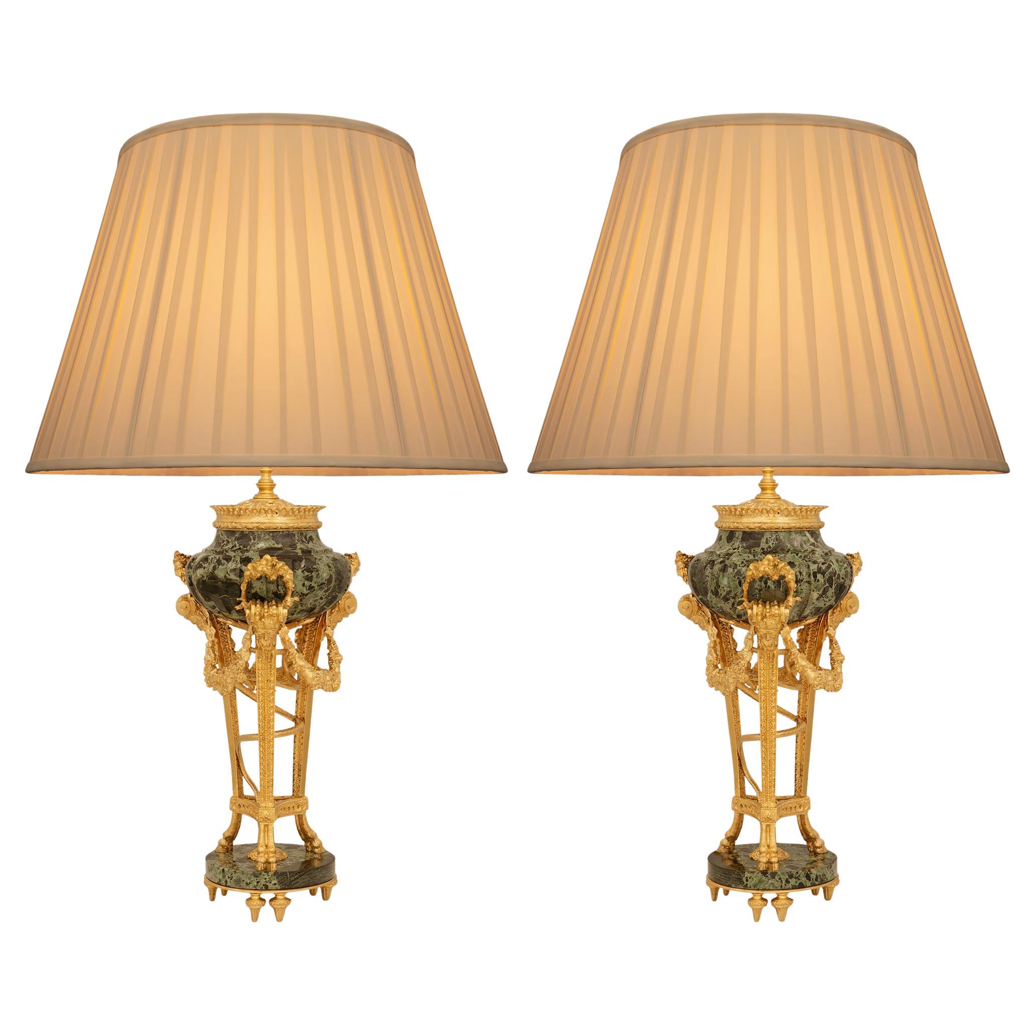 pair of French 19th century Louis XVI st. Marble and Ormolu lamps