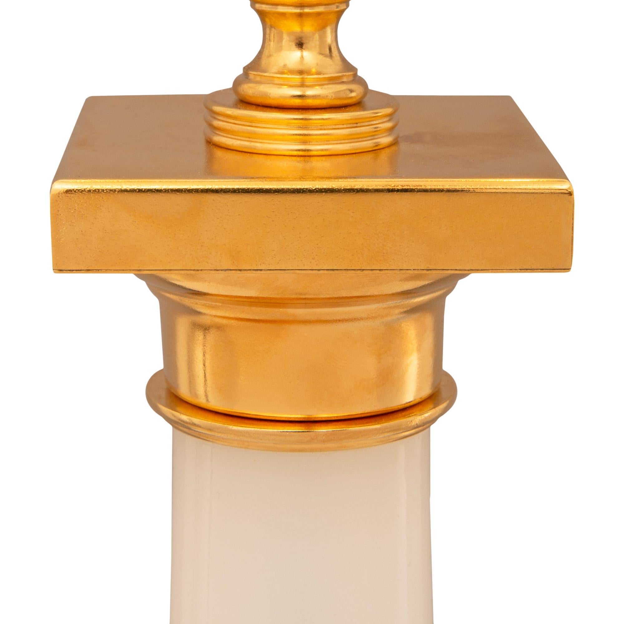 19th Century pair of French 19th century Louis XVI st. Opaline Glass and Ormolu lamps For Sale