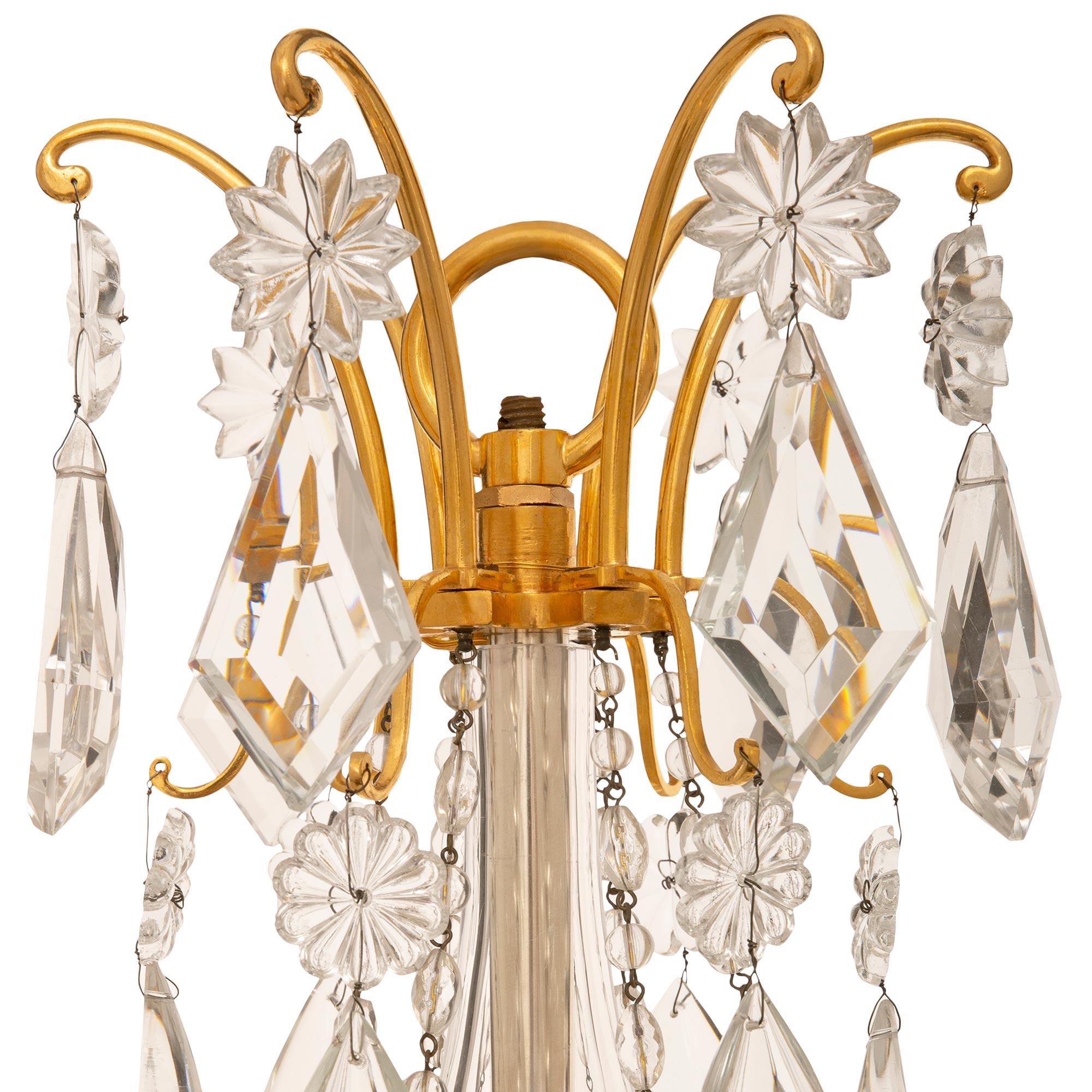19th Century pair of French 19th century Louis XVI st Ormolu and Baccarat Crystal chandeliers For Sale