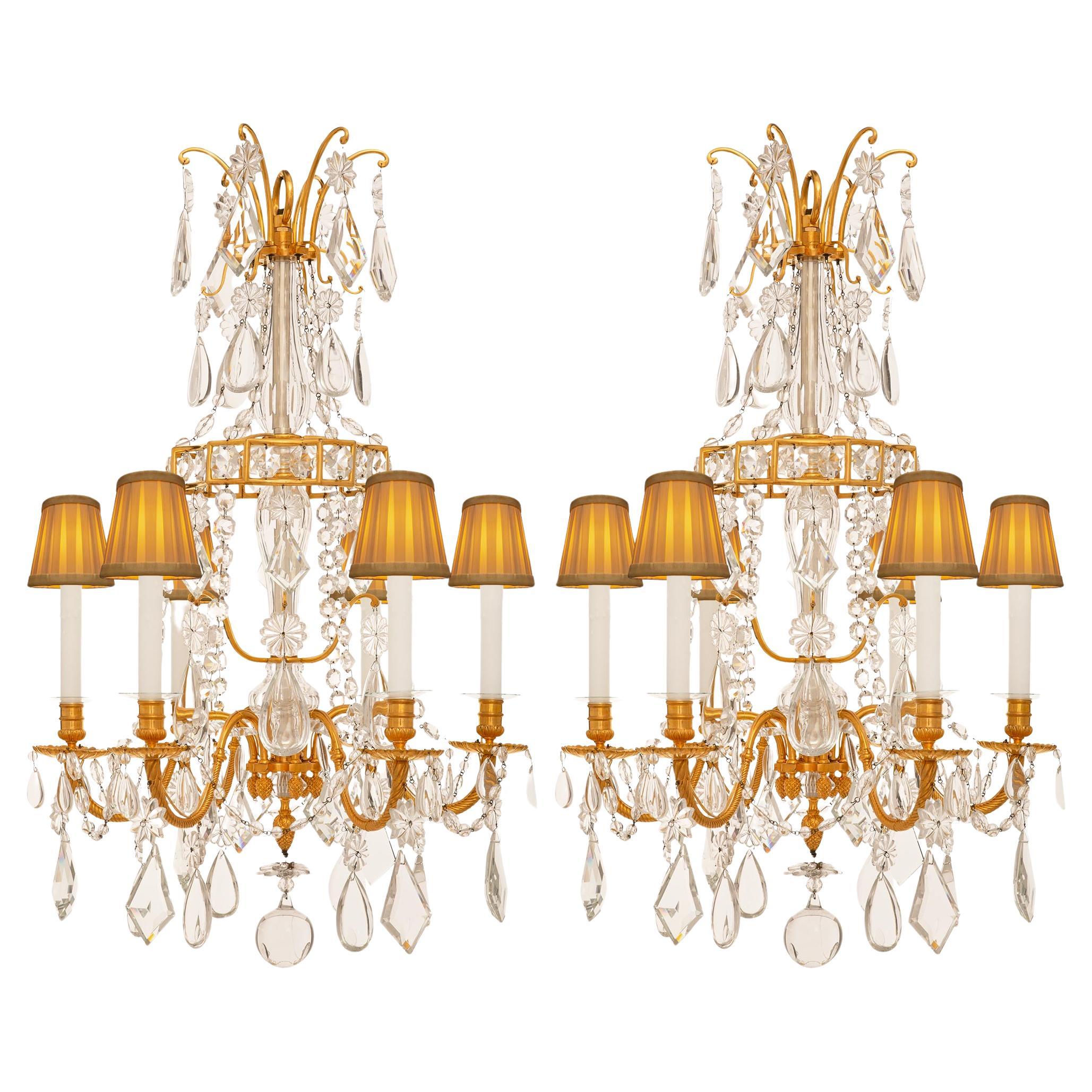 pair of French 19th century Louis XVI st Ormolu and Baccarat Crystal chandeliers For Sale