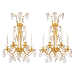 Pair of French 19th Century Louis XVI St. Ormolu and Baccarat Crystal Sconces