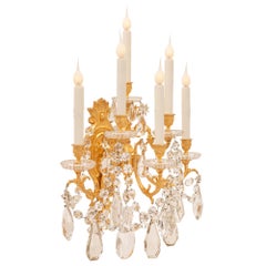 Pair of French 19th Century Louis XVI St. Ormolu and Baccarat Crystal Sconces
