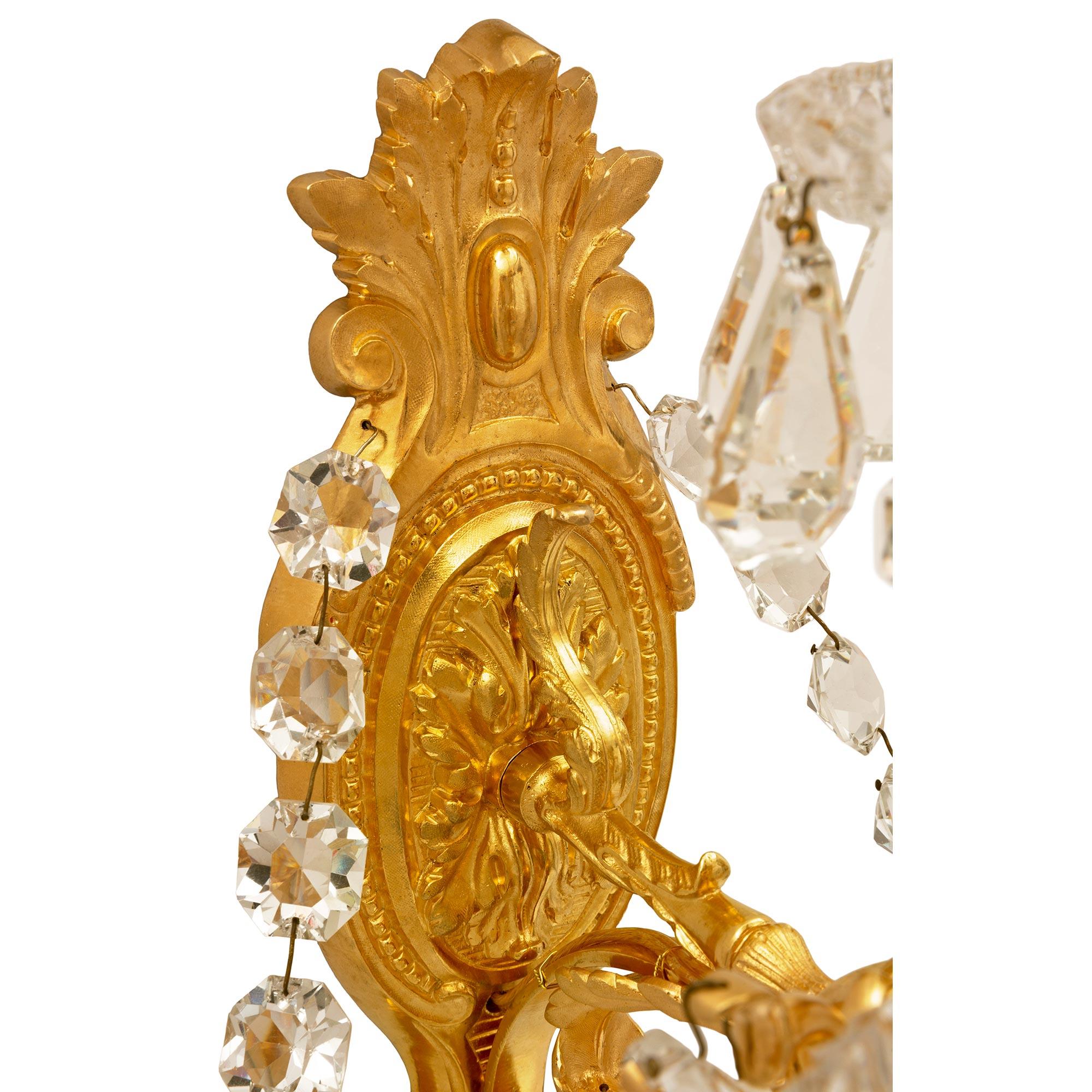 Pair of French 19th Century Louis XVI St. Ormolu and Baccarat Crystal Sconces For Sale 1