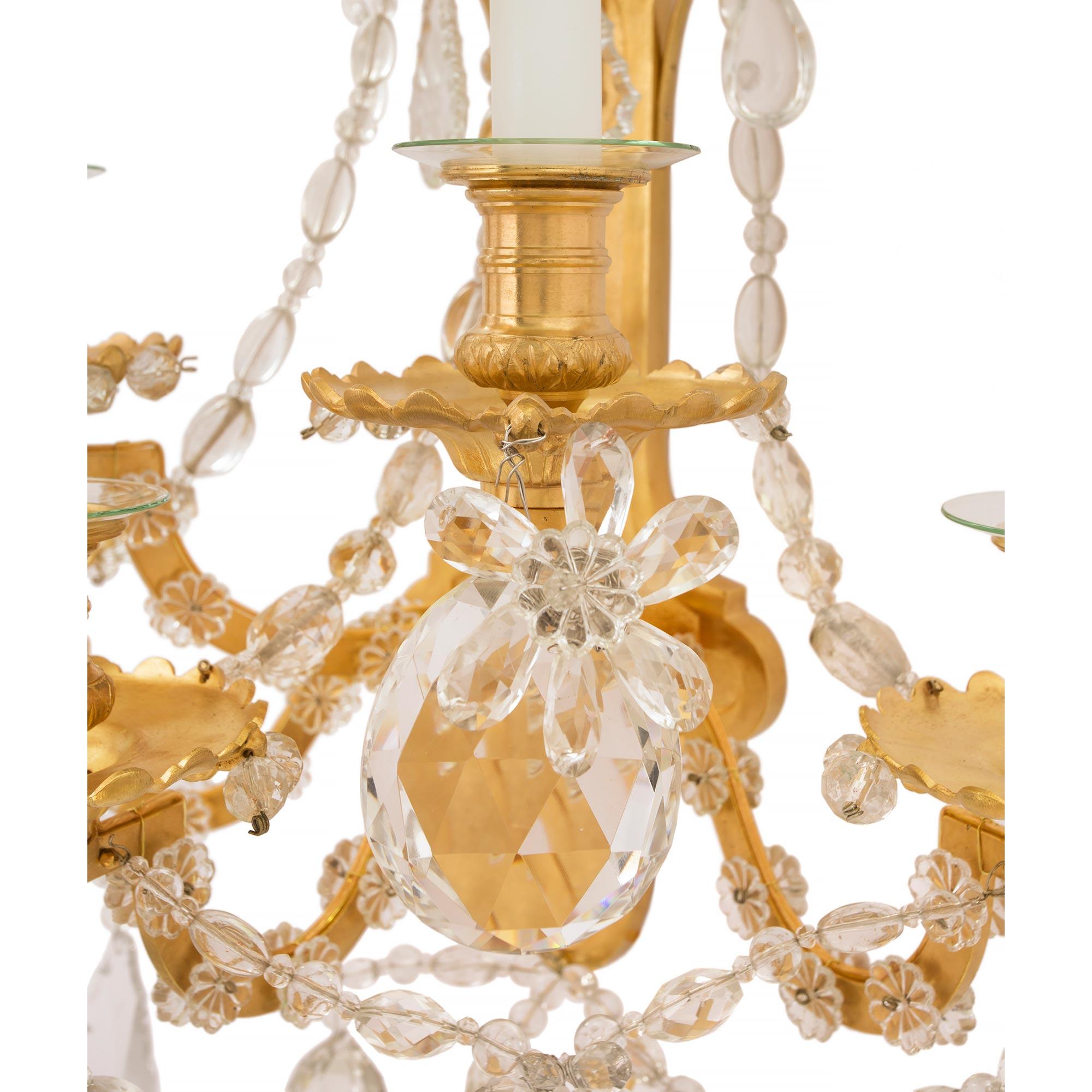  Pair of French 19th Century Louis XVI St. Ormolu and Baccarat Crystal Sconces For Sale 3