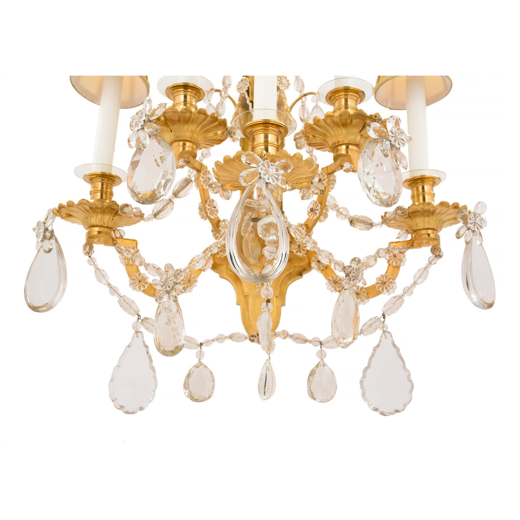  Pair of French 19th Century Louis XVI St. Ormolu and Baccarat Crystal Sconces For Sale 4