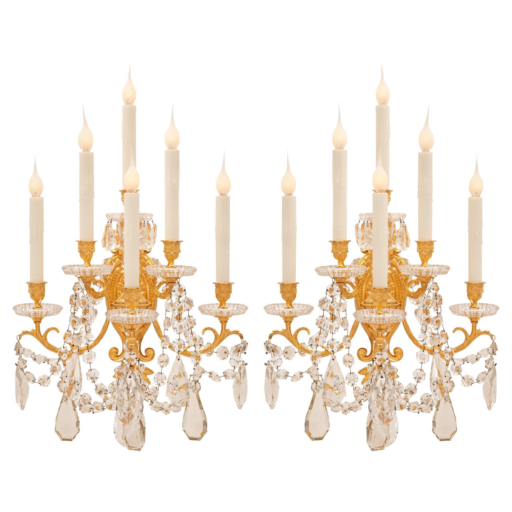 Pair of French 19th Century Louis XVI St. Ormolu and Baccarat Crystal Sconces For Sale