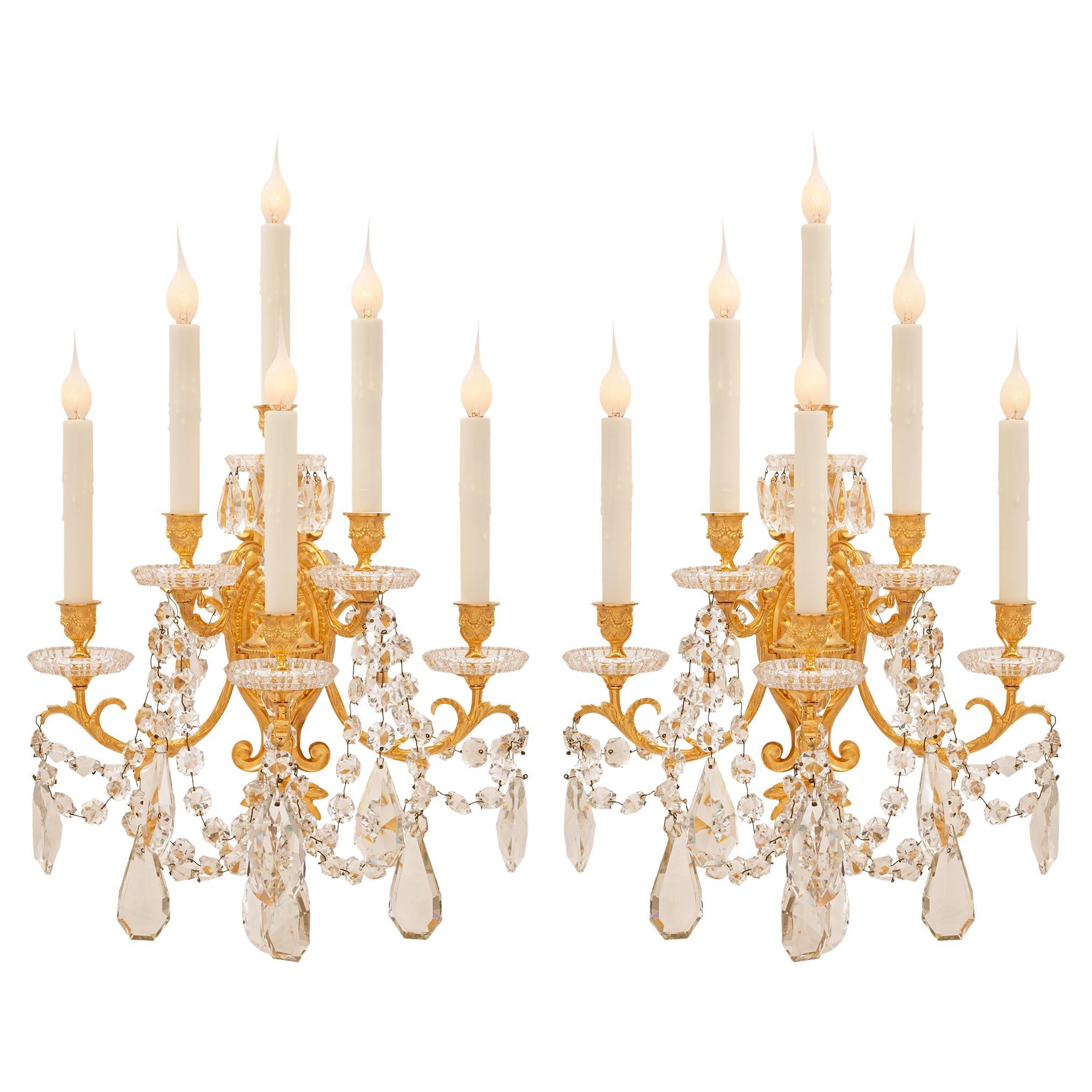 Pair of French 19th Century Louis XVI St. Ormolu and Baccarat Crystal Sconces