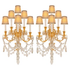 Pair of French 19th Century Louis XVI St. Ormolu and Baccarat Crystal Sconces