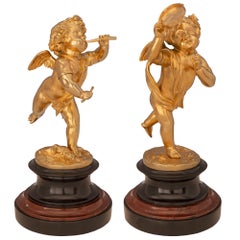 Coppia di statue in marmo e ormolu di stile Luigi XVI del XIX secolo