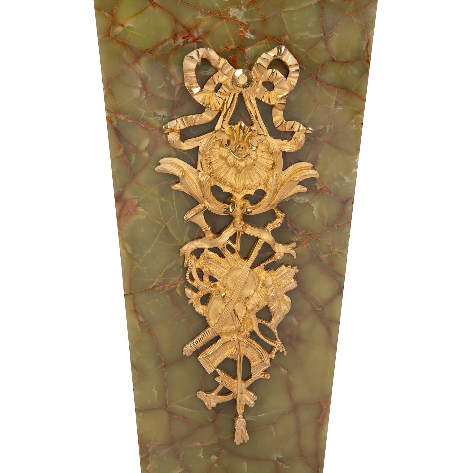 XIX secolo pair of French 19th century Louis XVI st. Ormolu and Onyx pedestals in vendita