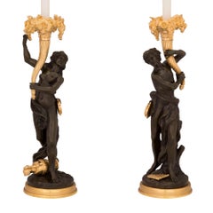 Pair of French 19th Century Louis XVI St. Ormolu and Patinated Bronze Lamps