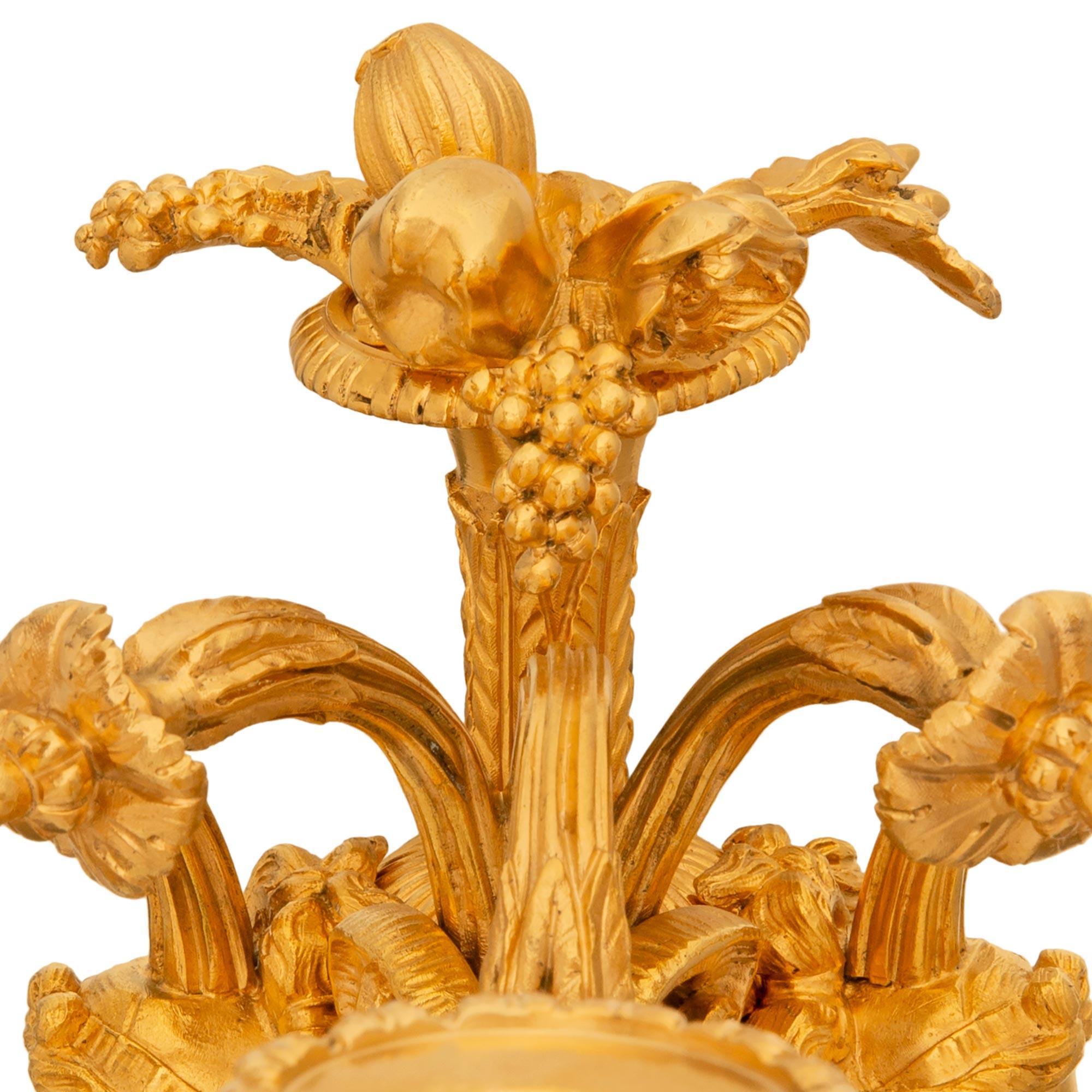 pair of French 19th century Louis XVI st. Ormolu and patinated Bronze sconces For Sale 1