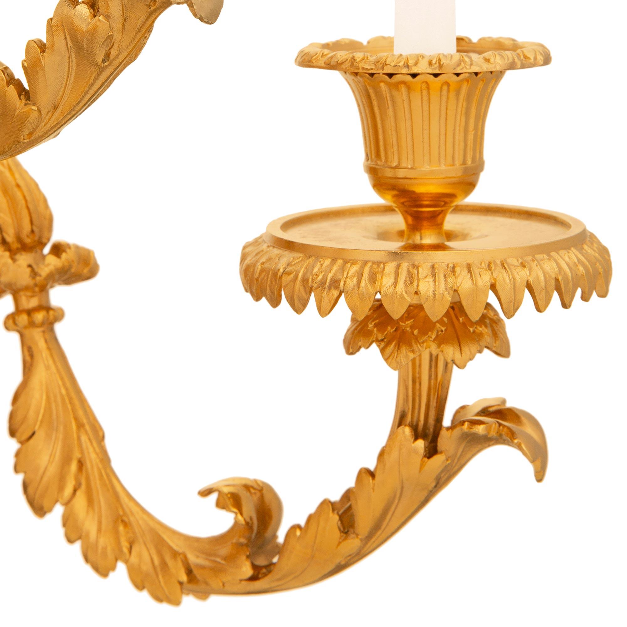 pair of French 19th century Louis XVI st. Ormolu and patinated Bronze sconces For Sale 3