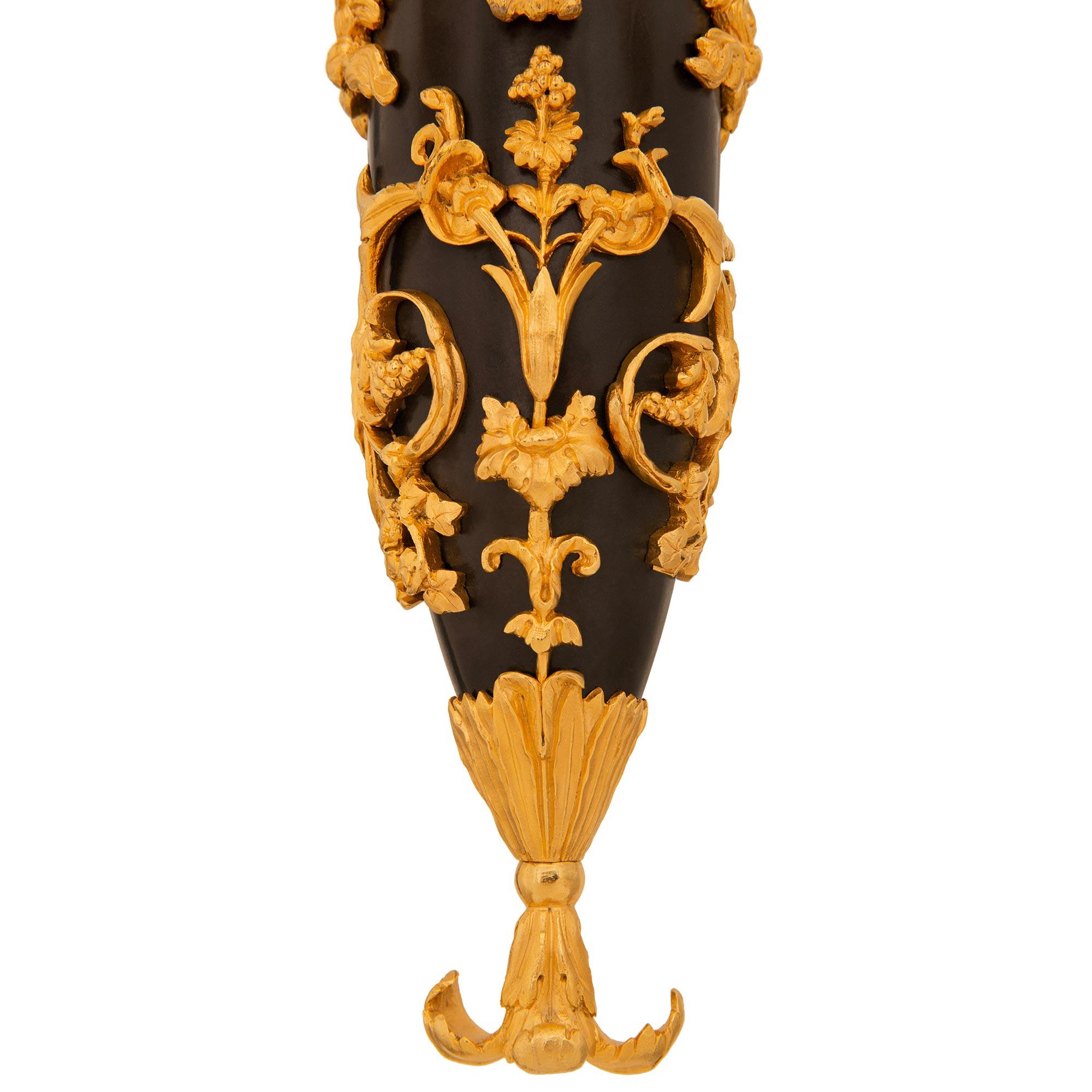 pair of French 19th century Louis XVI st. Ormolu and patinated Bronze sconces For Sale 4