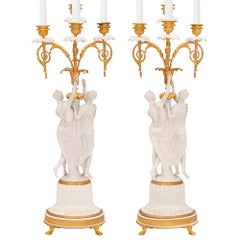 Pair of French 19th Century Louis XVI St. Ormolu and Porcelain Candelabras