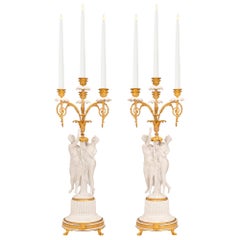 Pair of French 19th Century Louis XVI St. Ormolu and Porcelain Candelabra