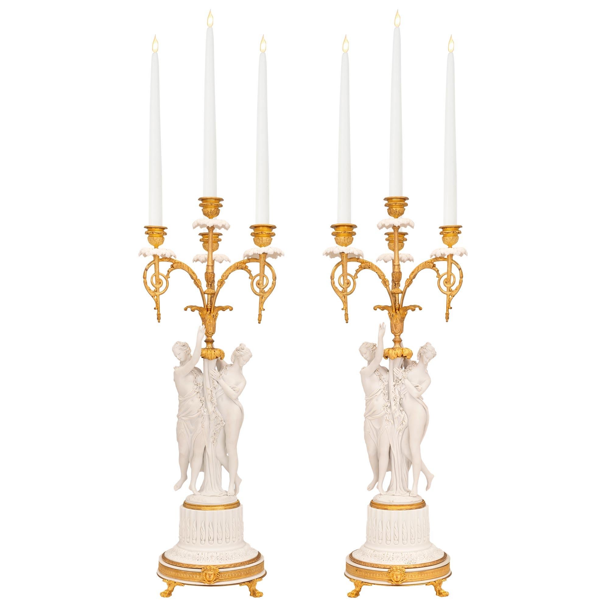 Pair of French 19th Century Louis XVI St. Ormolu and Porcelain Candelabras For Sale