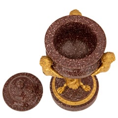 Pair of French 19th Century Louis XVI St. Ormolu and Porphyry Lidded Urns