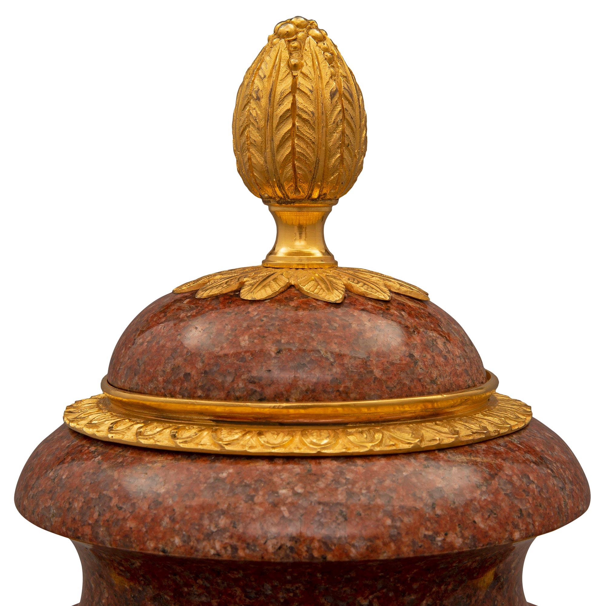 Pair of French 19th Century Louis XVI St. Ormolu and Red Granite Urns For Sale 2
