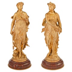 Antique Pair of French 19th Century Louis XVI St. Ormolu and Rouge Griotte Statues