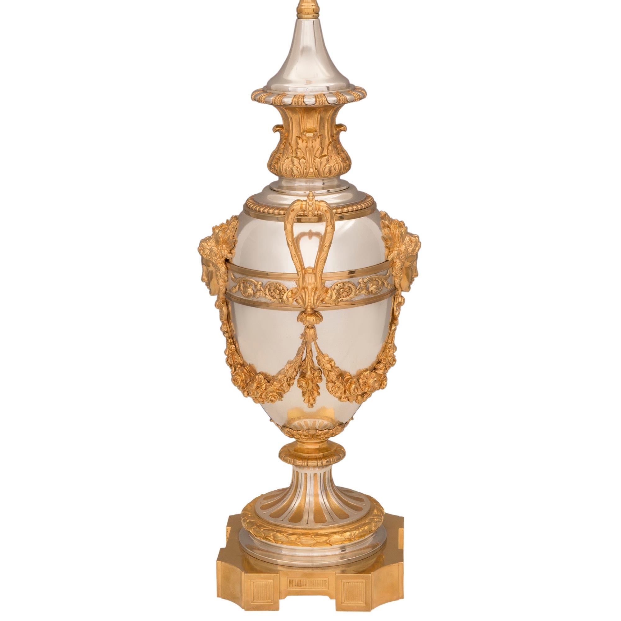 Pair of French 19th Century Louis XVI St. Ormolu and Silvered Bronze Lamps In Good Condition For Sale In West Palm Beach, FL