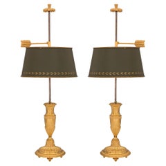 Paire de lampes Bouillotte françaises de style Louis XVI du 19ème siècle en bronze doré et tôle