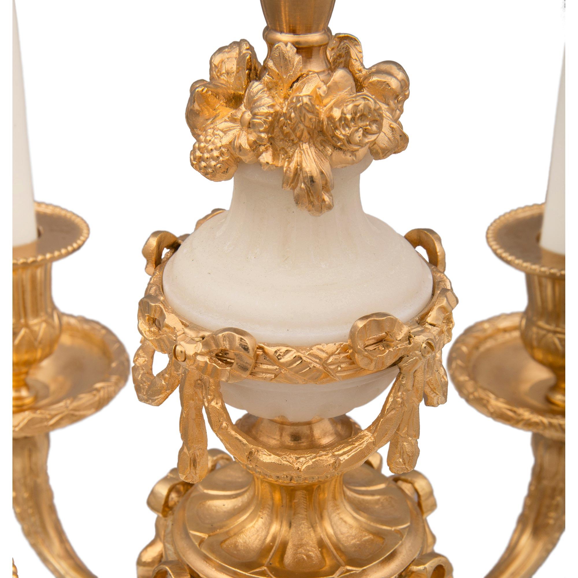 Pair of French 19th Century Louis XVI St. Ormolu and White Carrara Marble Lamps For Sale 1