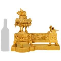 pair of French 19th century Louis XVI st. Ormolu andirons